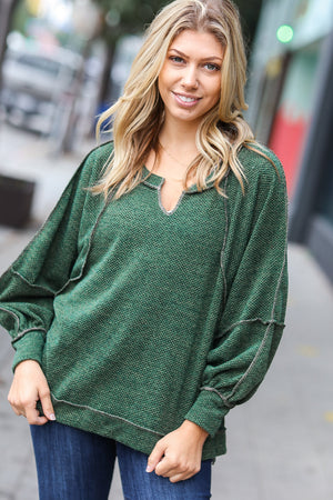 The Slouchy Olive Two Tone Knit Notched Raglan Top